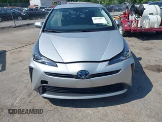 2021 Toyota Prius L Eco z VIN JTDKAMFU5M3137298, wystawiony jako IAAI lot #42270937 z przebiegiem 38 828 mil mil oraz . Historia ofert i sprzedaży dostępna na DreamBid. Obrazek 11.