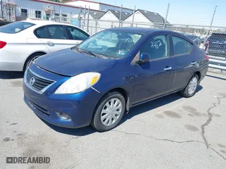 2014 Nissan Versa SV with VIN 3N1CN7AP9EL812462, listed as a IAAI auction lot 41890801 with 169,438 mi miles. Bid and sale history available at carsss.com. Image 2.