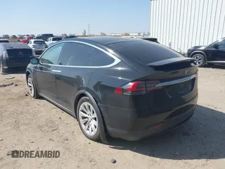 2019 Tesla Model X 75D with VIN 5YJXCBE22KF184504, listed as a IAAI auction lot 41802023 with 137,094 mi miles. Bid and sale history available at carsss.com. Image 3.