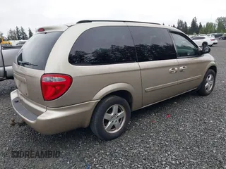 2007 Dodge Grand Caravan SXT with VIN 2D4GP44L57R344920, listed as a IAAI auction lot 42135210 with 154,208 mi miles and . Bid and sale history available at DreamBid. Image 4.
