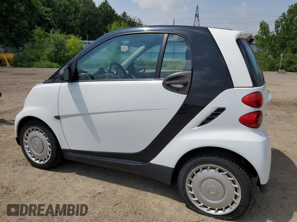 2010 Smart fortwo Pure с VIN WMEEJ3BA4AK399691, выставлен на аукционе Copart как лот 60283245 с пробегом 172 584 миль миль и Чистый • Clean title. История ставок и продаж доступна на DreamBid. Изображение 2.