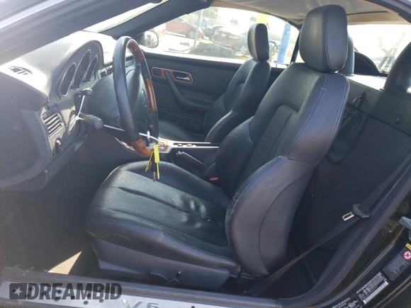 2002 Mercedes-Benz SLK-Class 3.2L with VIN WDBKK65F12F254172, listed as a Copart auction lot 74336334 with 148,405 mi miles and Salvage Title. Bid and sale history available at carsss.com. Image 7.