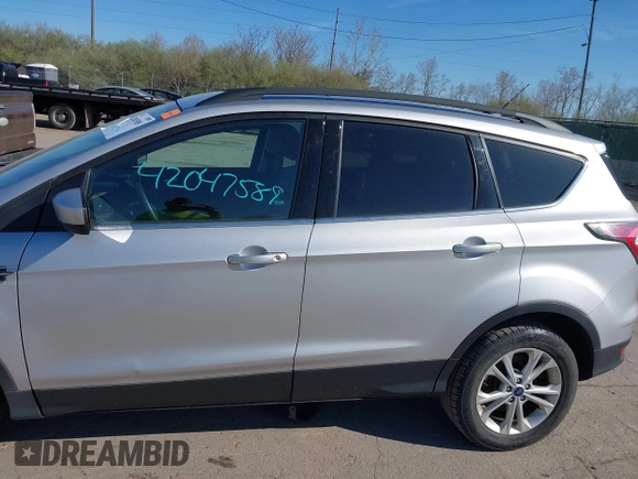 2017 Ford Escape SE with VIN 1FMCU0GDXHUB27848, listed as a IAAI auction lot 42047589 with 128,823 mi miles. Bid and sale history available at carsss.com. Image 14.