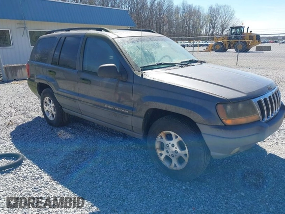 2002 Jeep Grand Cherokee z VIN 1J4GX38S92C149908, wystawiony jako IAAI lot #41782530 z przebiegiem 145 195 mil mil oraz . Historia ofert i sprzedaży dostępna na DreamBid. Obrazek 1.