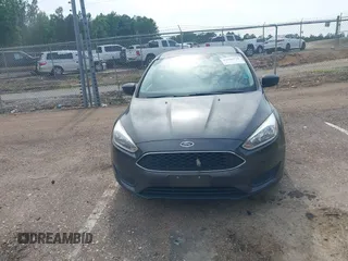 2018 Ford Focus SE with VIN 1FADP3F29JL288761, listed as a IAAI auction lot 42290510 with 93,463 mi miles and . Bid and sale history available at DreamBid. Image 13.