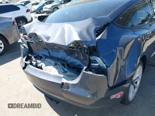 2023 Tesla Model 3 with VIN 5YJ3E1EA7PF673322, listed as a IAAI auction lot 42226767 with 18,367 mi miles and . Bid and sale history available at DreamBid. Image 6.