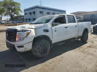 2022 Nissan Titan SV with VIN 1N6AA1FA8NN106193, listed as a Copart auction lot 56479285 with 27,443 mi miles and Salvage title. Bid and sale history available at DreamBid. Image 1.