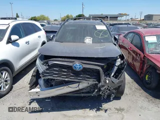2020 Toyota RAV4 Hybrid XLE with VIN 2T3RWRFV5LW058103, listed as a IAAI auction lot 42665299 with 112,634 mi miles and . Bid and sale history available at DreamBid. Image 13.