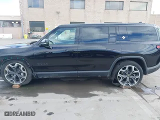 2025 Rivian R1S Adventure with VIN 7PDSGBBA5SN055497, listed as a IAAI auction lot 41695600 with 5,387 mi miles. Bid and sale history available at carsss.com. Image 15.