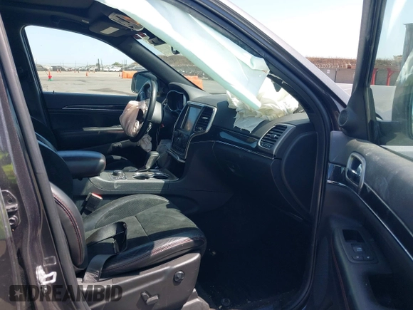 2017 Jeep Grand Cherokee Trailhawk with VIN 1C4RJFLG7HC654259, listed as a IAAI auction lot 42510197 with 103,947 mi miles and . Bid and sale history available at DreamBid. Image 5.