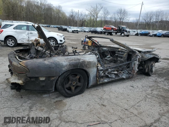 1997 Pontiac Firebird Trans Am z VIN 2G2FV32P4V2210845, wystawiony jako Copart lot #53998015 z przebiegiem Nie podano mil oraz Szkoda całkowita • Salvage title. Historia ofert i sprzedaży dostępna na DreamBid. Obrazek 3.