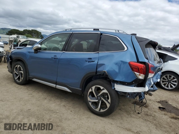 2024 Subaru Forester Touring with VIN JF2SKAMC2RH442467, listed as a Copart auction lot 53766735 with 7,206 mi miles and Salvage title. Bid and sale history available at DreamBid. Image 2.