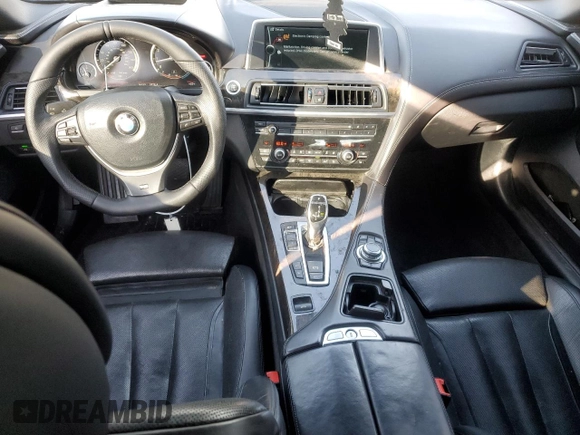 2012 BMW 6 Series 650i z VIN WBALZ3C50CDL70371, wystawiony jako Copart lot #80271534 z przebiegiem 76 332 mil mil oraz Szkody całkowita. Historia ofert i sprzedaży dostępna na DreamBid. Obrazek 8.