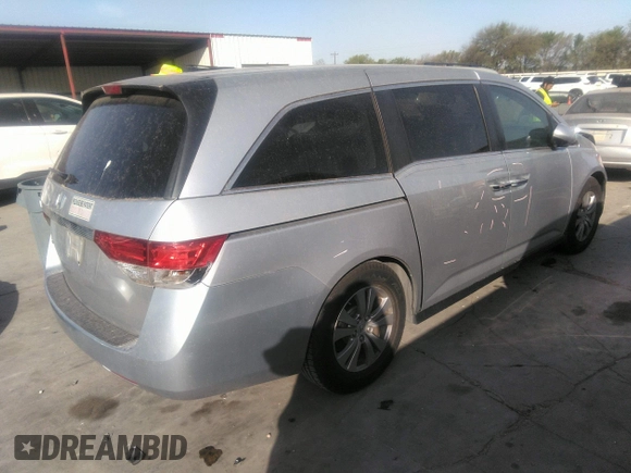 2014 Honda Odyssey EX-L with VIN 5FNRL5H65EB058750, listed as a IAAI auction lot 41853116 with 177,933 mi miles and . Bid and sale history available at carsss.com. Image 4.