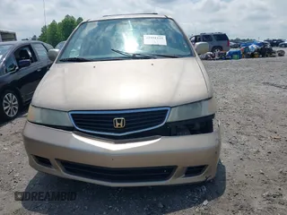 2000 Honda Odyssey EX with VIN 2HKRL1868YH513587, listed as a IAAI auction lot 42092115 with 302,555 mi miles and . Bid and sale history available at DreamBid. Image 12.