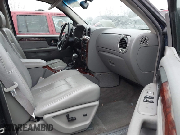 2006 GMC Envoy SLE z VIN 1GKDT13S862329493, wystawiony jako IAAI lot #41513303 z przebiegiem 118 355 mil mil oraz . Historia ofert i sprzedaży dostępna na DreamBid. Obrazek 5.