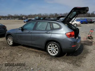 2015 BMW X1 xDrive28i with VIN WBAVL1C5XFVY31265, listed as a Copart auction lot 47543025 with 124,986 mi miles and Salvage Title. Bid and sale history available at carsss.com. Image 2.
