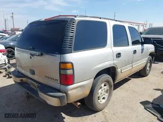 2005 Chevrolet Tahoe LS with VIN 1GNEC13V25R270657, listed as a IAAI auction lot 41876754 with 338,698 mi miles. Bid and sale history available at carsss.com. Image 4.