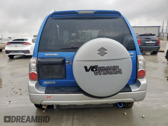 2005 Suzuki Grand Vitara LX with VIN JS3TD62V354200952, listed as a Copart auction lot 60374465 with 134,957 mi miles and Salvage title. Bid and sale history available at DreamBid. Image 6.