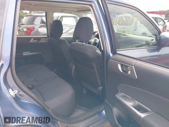 2012 Subaru Forester X Premium z VIN JF2SHADC5CH412689, wystawiony jako IAAI lot #42771071 z przebiegiem 143 409 mil mil oraz . Historia ofert i sprzedaży dostępna na DreamBid. Obrazek 8.