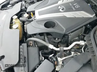 2016 Infiniti Q50 Premium z VIN JN1EV7AR1GM340874, wystawiony jako IAAI lot #42330653 z przebiegiem 100 009 mil mil oraz . Historia ofert i sprzedaży dostępna na DreamBid. Obrazek 19.