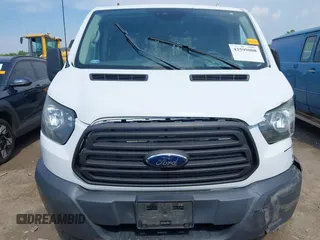 2016 Ford Transit Cargo with VIN 1FTYE1ZM6GKA84050, listed as a IAAI auction lot 42599008 with 135,943 mi miles and . Bid and sale history available at DreamBid. Image 12.