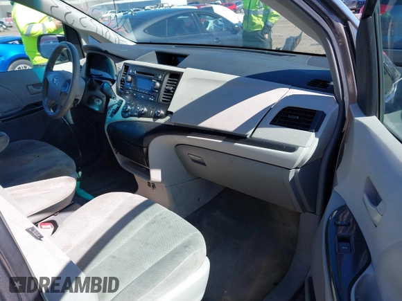 2011 Toyota Sienna with VIN 5TDZK3DC6BS125737, listed as a IAAI auction lot 41815233 with 248,318 mi miles. Bid and sale history available at carsss.com. Image 5.