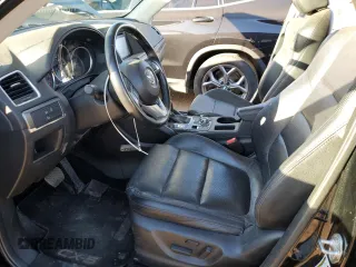 2016 Mazda CX-5 Grand Touring with VIN JM3KE4DY0G0731384, listed as a Copart auction lot 44741695 with 58,727 mi miles and Salvage Title. Bid and sale history available at carsss.com. Image 7.