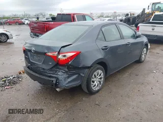 2019 Toyota Corolla L with VIN 5YFBURHE8KP873067, listed as a IAAI auction lot 41936471 with 75,076 mi miles and . Bid and sale history available at carsss.com. Image 4.