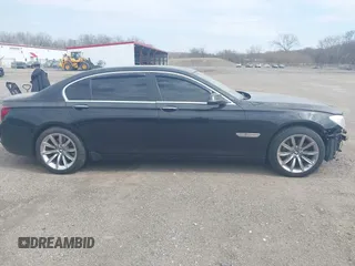 2015 BMW 7 Series 740Li xDrive with VIN WBAYF4C55FD874116, listed as a IAAI auction lot 41877144 with 156,280 mi miles. Bid and sale history available at carsss.com. Image 14.