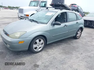 2004 Ford Focus with VIN 3FAFP37Z74R103228, listed as a IAAI auction lot 42658143 with 90,519 mi miles and . Bid and sale history available at DreamBid. Image 2.