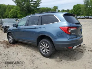 2019 Honda Pilot EX-L with VIN 5FNYF6H51KB025871, listed as a Copart auction lot 57434485 with 127,539 mi miles and Salvage title. Bid and sale history available at DreamBid. Image 2.