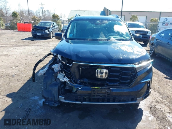 2023 Honda Pilot Elite with VIN 5FNYG1H80PB017732, listed as a IAAI auction lot 41643842 with 26,420 mi miles. Bid and sale history available at carsss.com. Image 6.