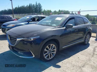 2018 Mazda CX-9 Grand Touring z VIN JM3TCBDY2J0237050, wystawiony jako IAAI lot #42457060 z przebiegiem 130 625 mil mil oraz . Historia ofert i sprzedaży dostępna na DreamBid. Obrazek 17.