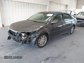 2009 Toyota Avalon XL with VIN 4T1BK36B19U348758, listed as a IAAI auction lot 39746698 with 141,454 mi miles and . Bid and sale history available at DreamBid. Image 16.