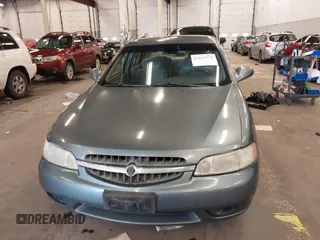2000 Nissan Altima XE with VIN 1N4DL01D4YC185986, listed as a IAAI auction lot 41831774 with 217,044 mi miles. Bid and sale history available at carsss.com. Image 13.