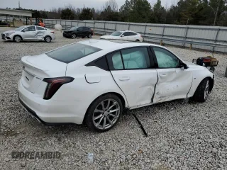 2024 Cadillac CT5 Sport z VIN 1G6DP5RK8R0130218, wystawiony jako Copart lot #45973105 z przebiegiem 6 878 mil mil oraz Szkoda całkowita • Salvage title. Historia ofert i sprzedaży dostępna na DreamBid. Obrazek 3.