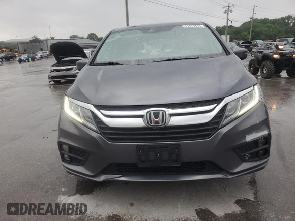 2018 Honda Odyssey EX with VIN 5FNRL6H50JB047999, listed as a Copart auction lot 57819495 with 121,295 mi miles and Salvage title. Bid and sale history available at DreamBid. Image 5.