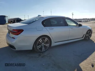 2017 BMW 7 Series 750i with VIN WBA7F0C39HGM22030, listed as a Copart auction lot 87127484 with 110,634 mi miles and Salvage title. Bid and sale history available at DreamBid. Image 3.
