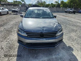 2017 Volkswagen Jetta S with VIN 3VW2B7AJ9HM344306, listed as a Copart auction lot 60256965 with 23,055 mi miles and Salvage title. Bid and sale history available at DreamBid. Image 5.