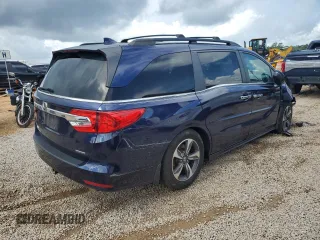 2019 Honda Odyssey Touring z VIN 5FNRL6H8XKB027156, wystawiony jako Copart lot #60735455 z przebiegiem 100 044 mil mil oraz Szkoda całkowita • Salvage title. Historia ofert i sprzedaży dostępna na DreamBid. Obrazek 3.