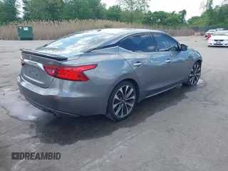2016 Nissan Maxima SL with VIN 1N4AA6AP7GC395308, listed as a IAAI auction lot 42187762 with 154,171 mi miles and . Bid and sale history available at DreamBid. Image 4.