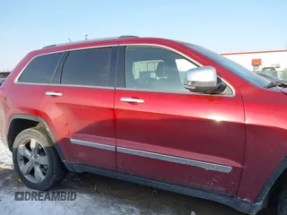 2013 Jeep Grand Cherokee Overland with VIN 1C4RJFCT3DC543862, listed as a IAAI auction lot 41370366 with 65,978 mi miles. Bid and sale history available at carsss.com. Image 13.