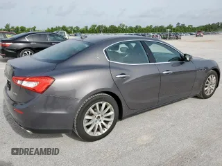 2017 Maserati Ghibli z VIN ZAM57XSA9H1206127, wystawiony jako Copart lot #56883775 z przebiegiem 13 439 mil mil oraz Czysty tytuł • Clean title. Historia ofert i sprzedaży dostępna na DreamBid. Obrazek 3.
