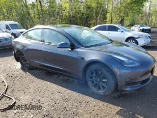 2023 Tesla Model 3 z VIN 5YJ3E1EAXPF404814, wystawiony jako Copart lot #56857105 z przebiegiem 59 360 mil mil oraz Czysty tytuł • Clean title. Historia ofert i sprzedaży dostępna na DreamBid. Obrazek 4.
