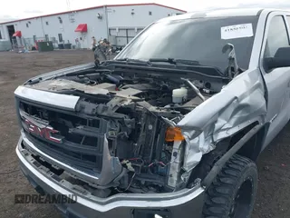 2014 GMC Sierra 1500 with VIN 3GTU2TEH8EG223028, listed as a IAAI auction lot 41858801 with 173,825 mi miles. Bid and sale history available at carsss.com. Image 6.