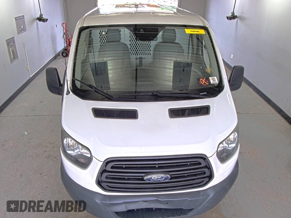 2017 Ford Transit with VIN 1FTYE1YM8HKA28386, listed as a IAAI auction lot 42730202 with 224,557 mi miles and . Bid and sale history available at DreamBid. Image 13.