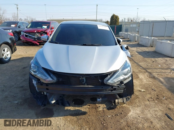 2018 Nissan Sentra S with VIN 3N1AB7AP1JY217456, listed as a IAAI auction lot 41647997 with 141,179 mi miles and . Bid and sale history available at DreamBid. Image 13.