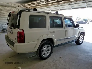2008 Jeep Commander Limited with VIN 1J8HH58N28C130633, listed as a Copart auction lot 61009065 with 206,121 mi miles and Salvage title. Bid and sale history available at DreamBid. Image 3.