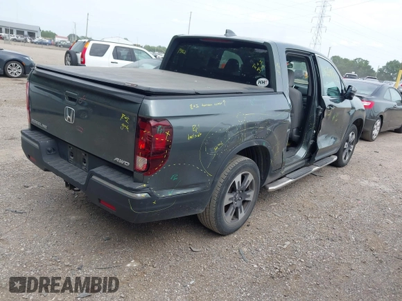 2018 Honda Ridgeline RTL-T with VIN 5FPYK3F61JB013733, listed as a IAAI auction lot 42548122 with 92,407 mi miles and . Bid and sale history available at DreamBid. Image 4.